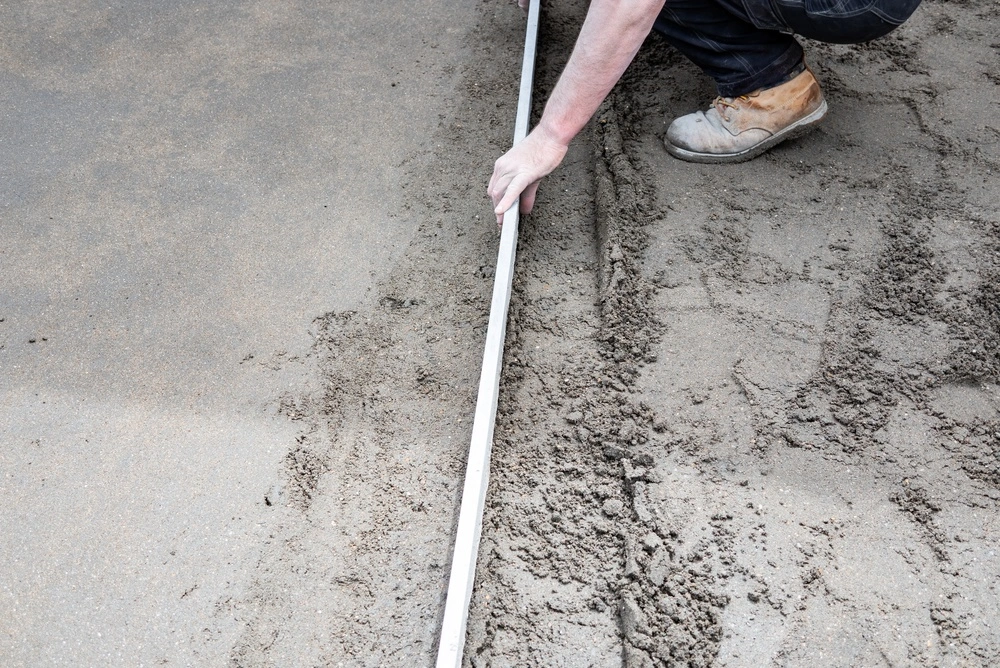 groundworks company laying concrete in Sussex